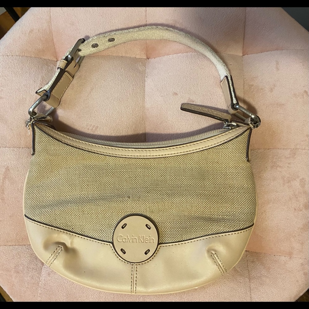 Cream colored Calvin Klein clutch like new!